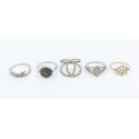 A collection of five Gems TV diamond set rings to include a 9ct yellow gold and diamond collet set