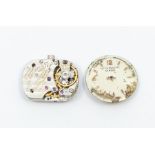 A Patek Philippe movement, no.1100008, 18 jewels; together with a Patek dial