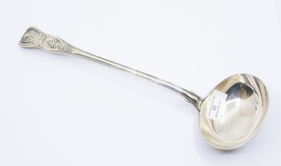 An early Victorian King's pattern silver soup ladle, the handle engraved with a crest, hallmarked by