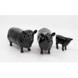 Three John Beswick figures of a black bull, cow and calf no chips or cracks