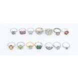 A collection of gems tv silver and gem set rings to include opal, garnet, peridot, tourmaline,