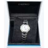 A ladies Seiko 'Solar' diamond set mother of pearl steel cased wristwatch, round mother of pearl