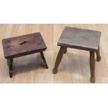 A pair of small vintage milking stools