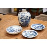 A chinese blue and white vase; together with three chinese blue and white dishes (4)