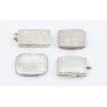 A collection of four silver vinaigrettes to include:  1. Victorian engraved rectangular, grille