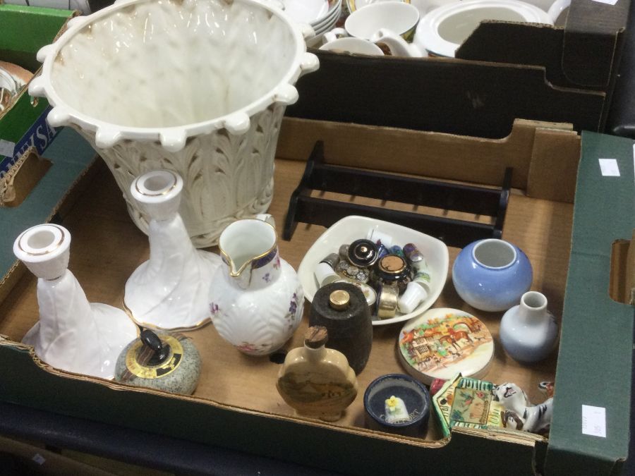 A collection of ceramics and china wares to include a planter, thimbles, trinket boxes, small