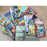 A collection of childrens annuals including Beano, Topper, Viz and others