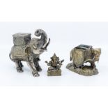 Two Indian elephant vesta holders, early 20th Century, along with The Indian God Ganesh
