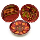 Poole Pottery: 3 Poole Pottery Delphis shallow bowls on red ground, shape mark 3. Diameter approx