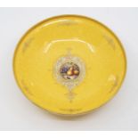 An early 20th Century Royal Worcester decorative bowl, shape no: 2769, mottled yellow ground with