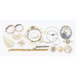 A collection of white metal jewellery to include an early 20th century miniature portrait brooch a/f