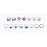 A collection of fifteen Gems TV silver and gemstone rings to include an opal and white topaz cross