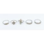 A collection of five Gems TV silver and diamond set rings to include two cluster rings, both size