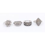A collection of four diamond and silver Gems TV gem set rings to include three white diamond cluster