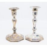 A pair of George II STYLE silver octagonal candlesticks with detachable drip pans, hallmarked by