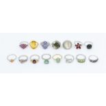 A collection of fifteen Gems TV silver and gemstone rings to include a ruby set ring in the form