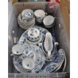 A large collection of German Hutschenreuther Meissen style blue and white onion pattern including