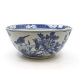 A Chinese large bowl decorated with birds and flowers, underglaze