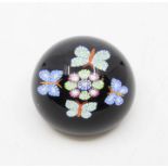 John Deakin paperweight purple ground with millefiori centre and four millefiori formed