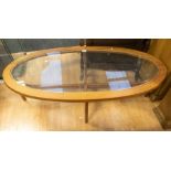 Oval glass top 1970's teak coffee table