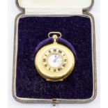 An early 1900's 18ct gold half hunter pocket watch, silvered dial with roman numeral markers,