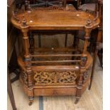 A Victorian walnut Canterbury, having turned legs on original castors, top galleried shelf with