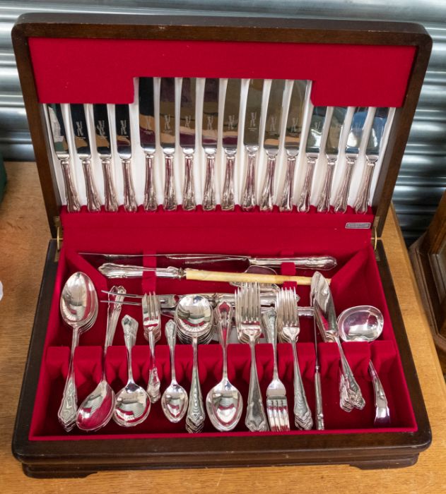 A Modern Sheffield plate canteen of cutlery, shaped handles, eight pieces (1)