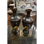 A pair of Cloisonne vases with dragon detail and a small pair of vases