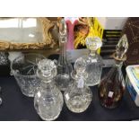 A collection of five mid 20th Century lead cut glass decanters, including champagne cut glass