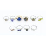 A collection of ten Gems TV silver and gemstone rings to include a red diamond floral cluster,