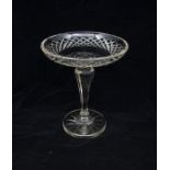 An early 20th Century good quality footed comport, cut glass, with a yellow hulme