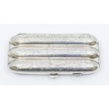 Derbyshire Interest: An Edwardian silver triple compartment cigar holder, profusely engraved with
