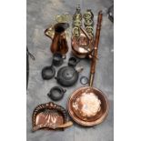 A collection of brass and copper wares including a kettle