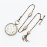 A late 19th century Swiss silver ladies fob watch, white enamel dial with Roman numeral markers