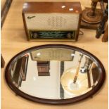 A 1950's Ferguson radio (working) along with an oval wall mirror