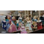 A collection of lady figurines from an assortment of Staffordshire factories (some AF)