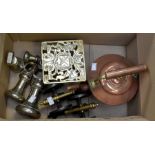 A collection of copper and brassware to include: a graduating set of four brass weights, copper