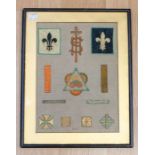 A textile framed work of religious symbols