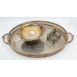 A late Victorian silver raised bowl, wavy cut card rim on three scroll and foliate feet,