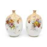 A Pair of Doulton, Burslem ovoid vases with floral decoration. Height approx 20cm.