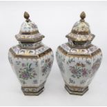 Pair of 18th Century Armorial porcelain vases, Chinese export with lids, highly decorated both are