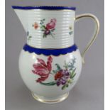 A late eighteenth century Derby porcelain ale jug, c. 1780. It is hand-painted with flowers,