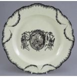 A late eighteenth century black and white transfer-printed creamware moulded plate, c. 1775. It is