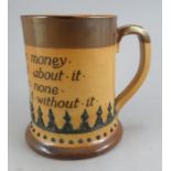 A late nineteenth century Doulton Lambeth stoneware large motto mug, c. 1895. It is decorated