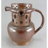 A late eighteenth century brown glazed Nottingham stoneware puzzle jug, c. 1780. It has three