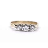 A 9ct three stone diamond ring, total diamond weight approx 0.45ct, 2.1g