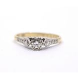 An 18ct solitaire diamond ring, claw set round  brilliant of approx 0.15ct, 2.7g