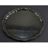 A Georgian style shaped circular salver with moulded and gadrooned border, by Mappin and Webb,