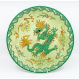 Crown Ducal charger by Charlotte Rhead with dragon design. Diameter approx 32.5cm. Marks to the