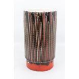***RE-OFFER JAN A/C £40-£50*** Poole Pottery: A Poole Pottery carved vase on a red ground. Height